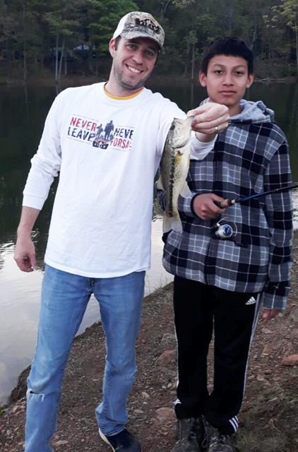 Fathers in the Field Mentor Father Matt and Field Buddy David fishing